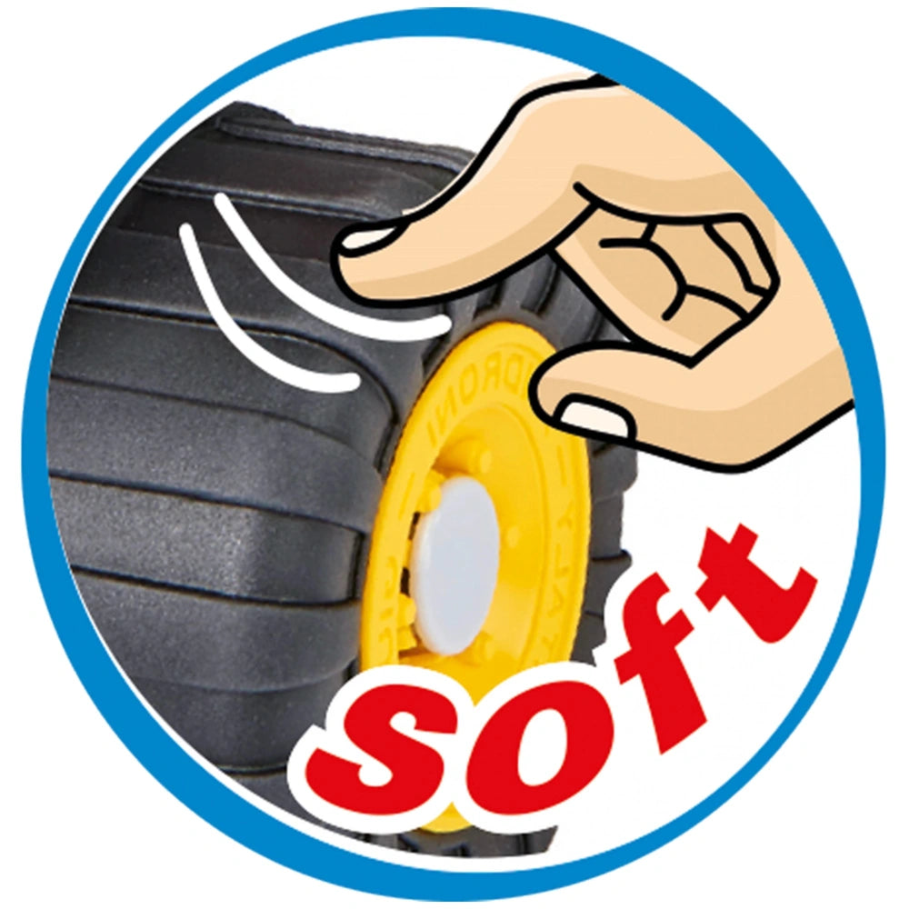 Soft-touch black tire with yellow hub on a toy vehicle, highlighted by a finger pressing to show flexibility.