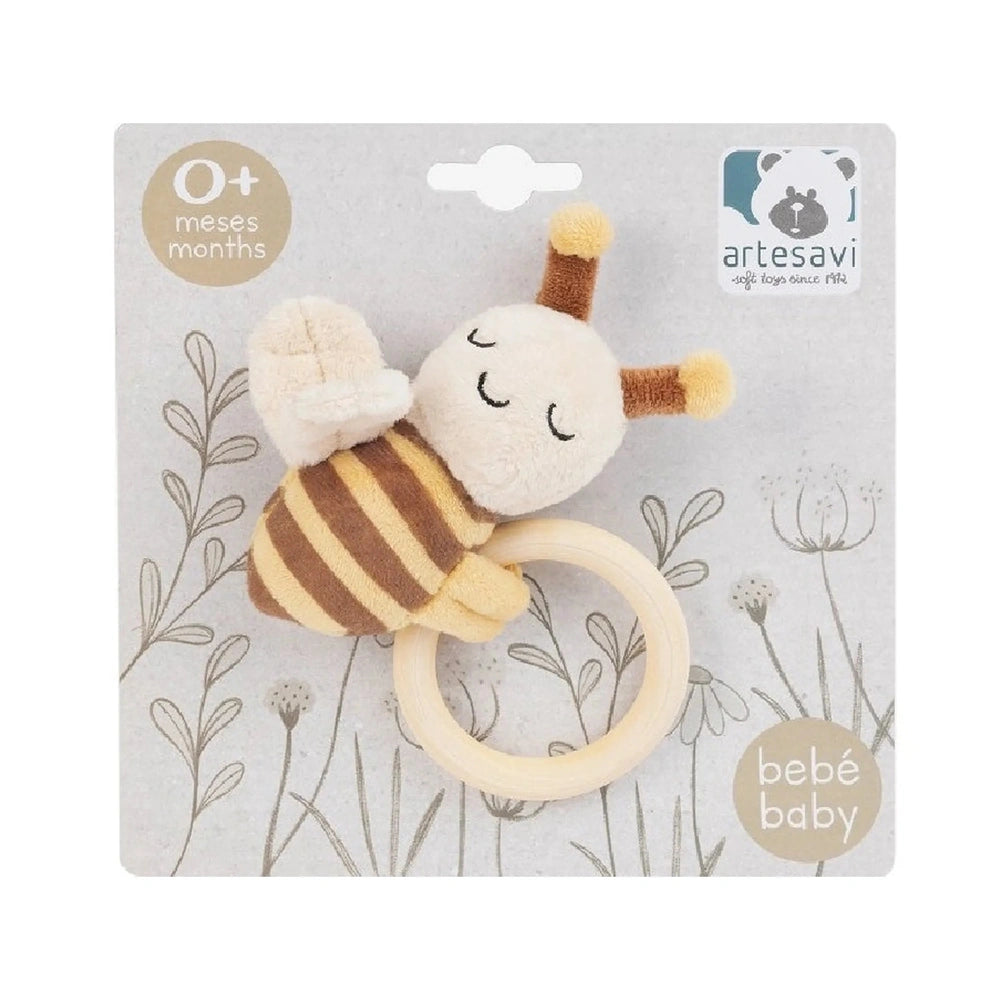 Adorable Artesavi bee plush rattle for babies, with brown stripes and smiling face, attached to a soft yellow ring.