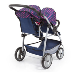 BAYER DESIGN Twin Pram in unicorn blue and pink features a shiny metallic frame, fabric seat with pink hearts, and black rubb