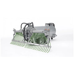 Bruder Fliegl barrel trailer with green spread tubes, gray tank, and black hoses, showcasing realistic design details.