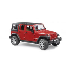 Red Bruder Jeep Wrangler Unlimited Rubicon toy vehicle with detailed design, off-road tires, and black roof.