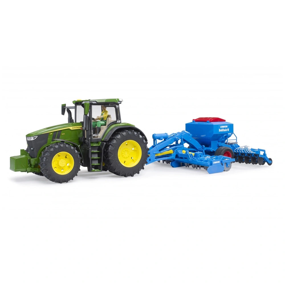 Green tractor with yellow wheels towing a detailed blue Bruder Lemken Solitair 9 Sowing Combination toy.