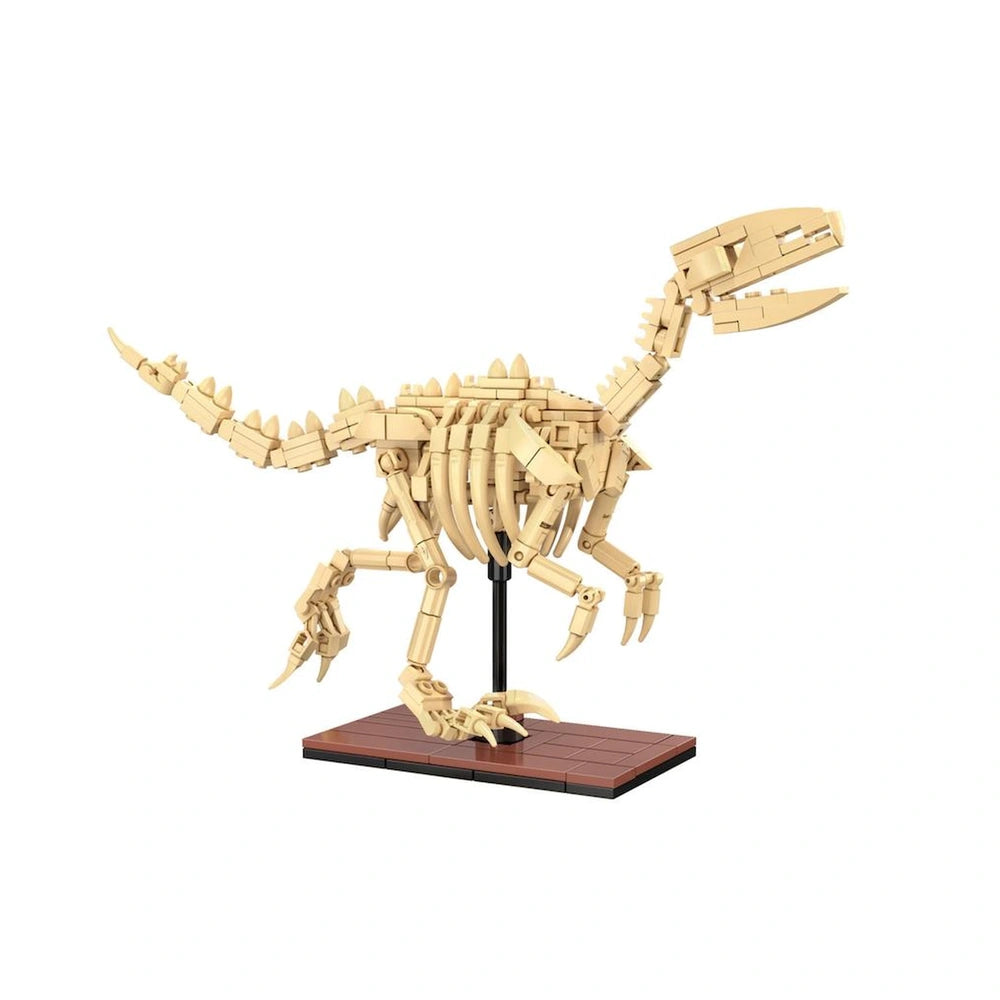 Cada Dinosaur-Fossil-Velociraptor construction set features a detailed dinosaur model with legs, claws, teeth, and a tail.