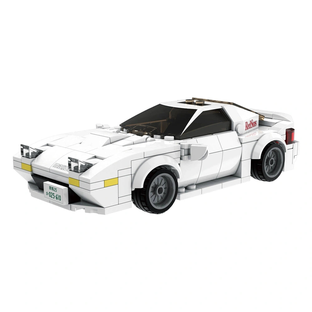 CaDA Initial D Mazda RX-7 FC3S construction set in white with black roof, yellow accents, and detailed wheels, headlights, an