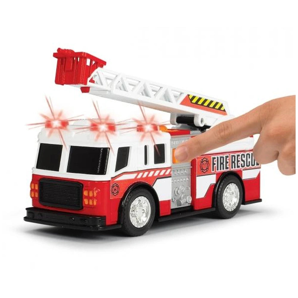 Dickie fire truck toy features a glossy red and white body, black wheels, and a white ladder with a fire rescue logo.