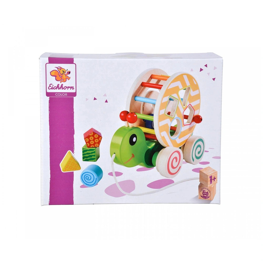 Colorful wooden pull-along train set featuring a smiling engine, vibrant train cars, and playful accessories for children.