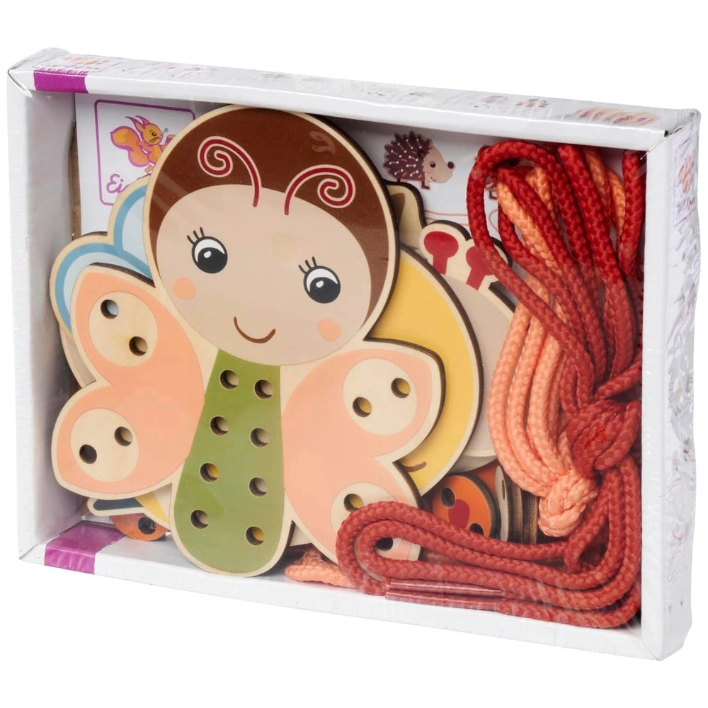 Eichhorn String Game features colorful craft items including a cartoon girl cutout and various playful shapes for baby activi