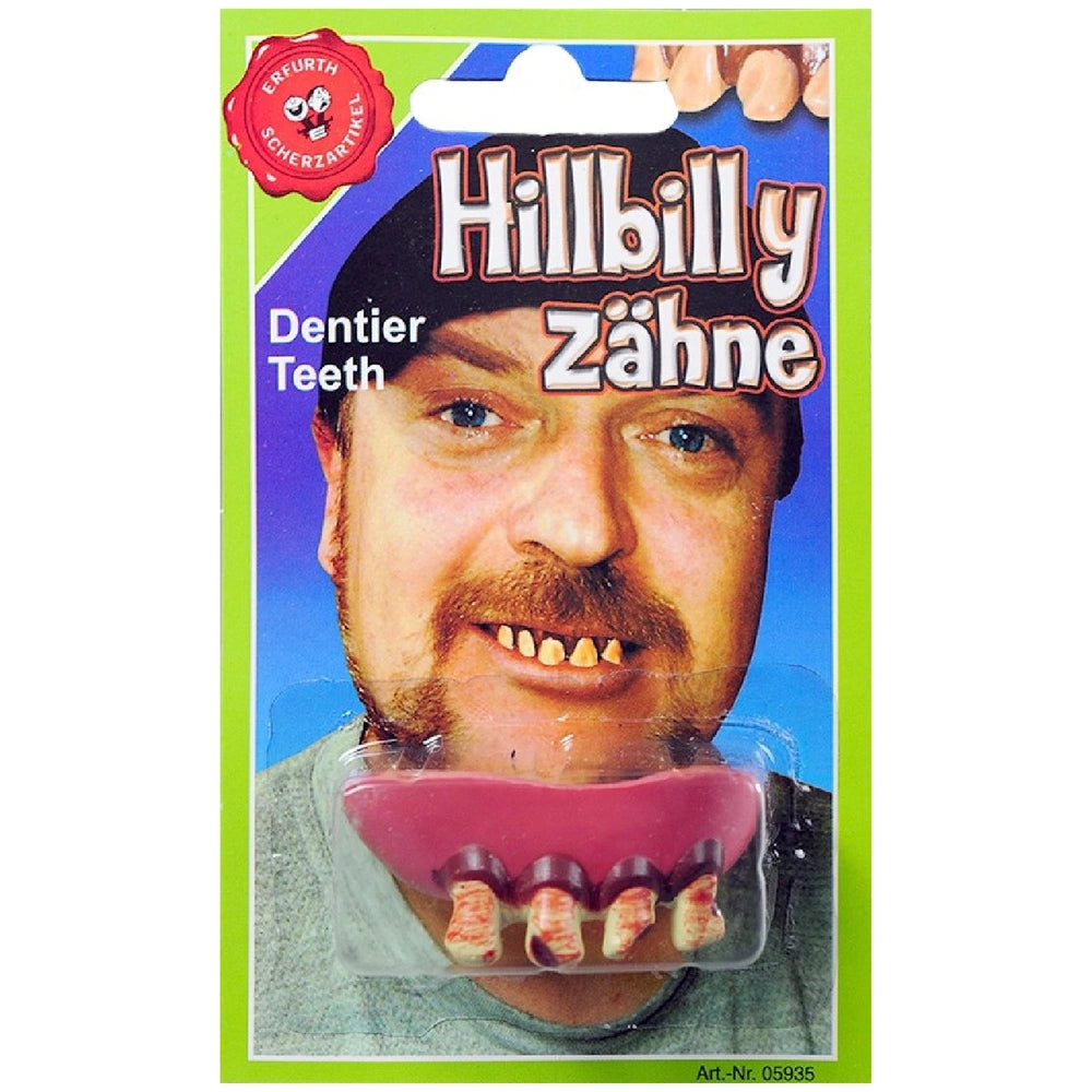 Hillbilly prosthetic dentures in soft foam latex displayed in green packaging with a transparent window and bold white text.