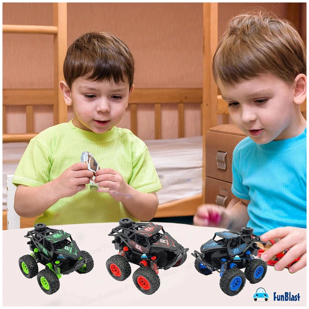 Dinosaur-themed monster trucks with pull-back action displayed on a wooden nightstand, with two boys playing nearby.