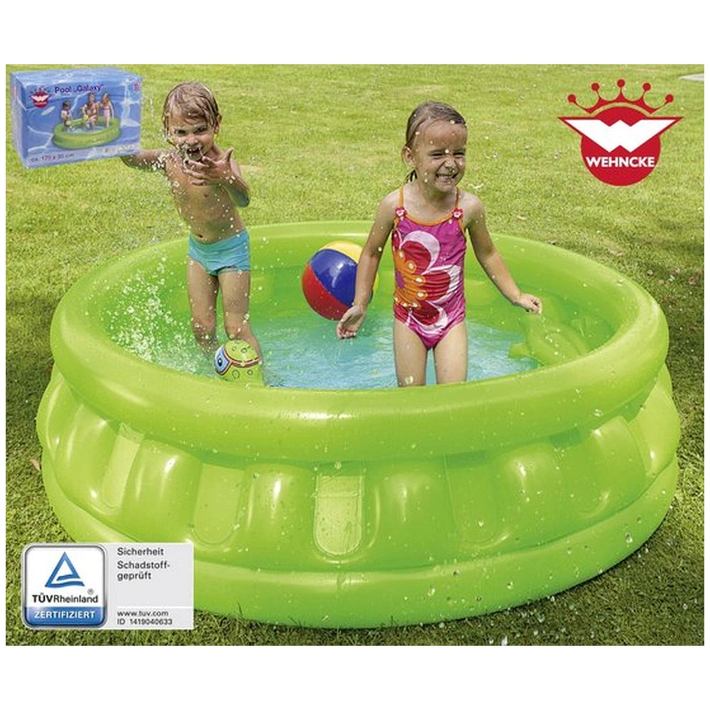 Happy People inflatable pool with two children in swimsuits playing with a red ball on green grass, featuring safety certific
