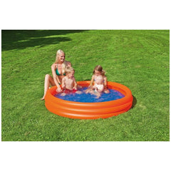 Happy People inflatable pool with orange ring, surrounded by three people on green grass, enjoying summer fun.