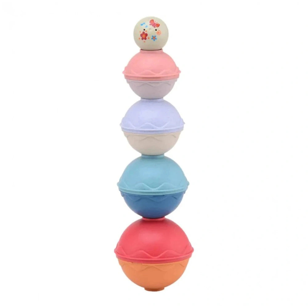 Happy World stacking balls toy featuring three vibrant, glossy balls: white floral, pink, and orange, stacked in a balanced a