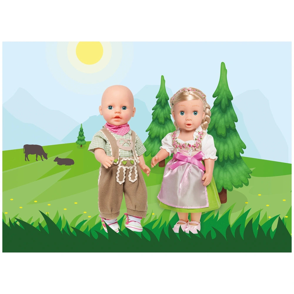 Heless Dirndl Heidi dolls, dressed in pink and white outfits, hold hands against a painted grassy backdrop with blue sky.