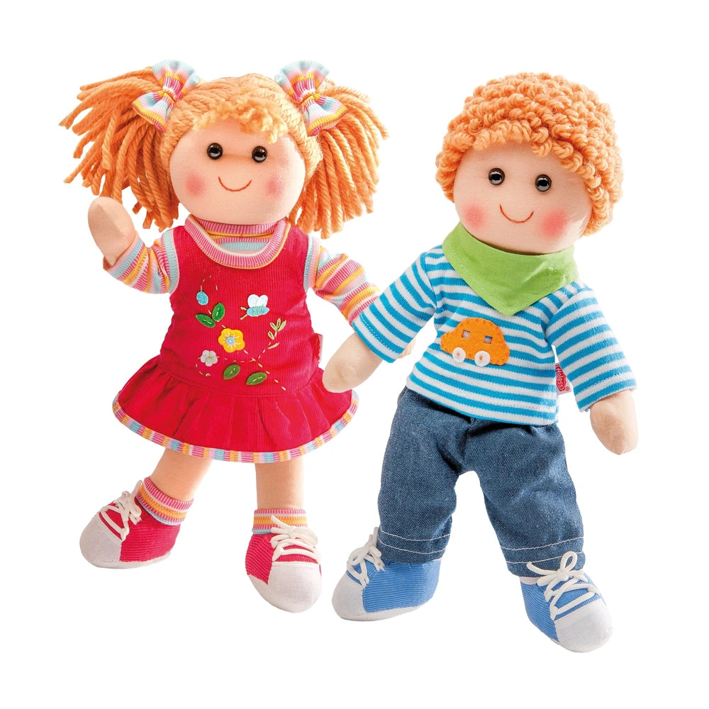 Heless Nici Soft Doll set featuring two plush dolls with orange and blonde hair, dressed in colorful outfits and shoes.