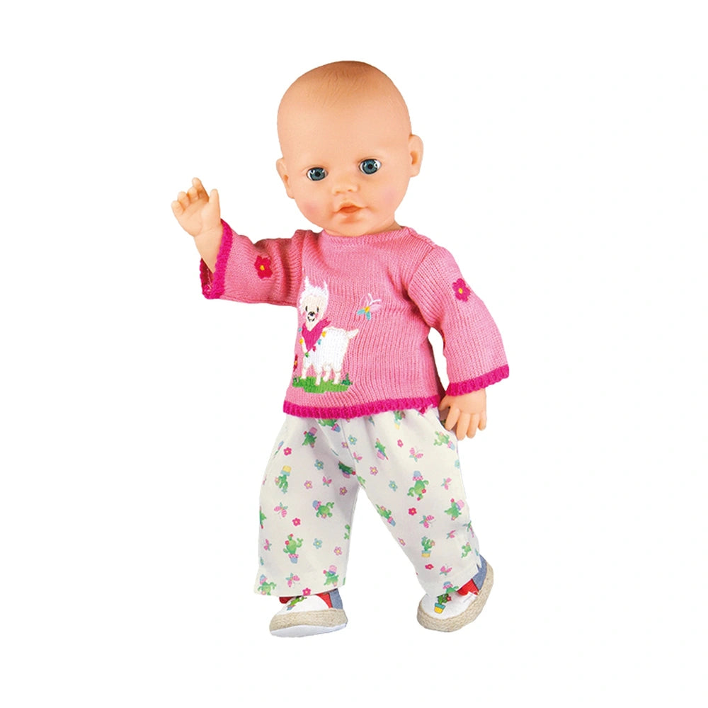 Heless Alpaca Oscar doll wearing pink floral outfit with blonde hair, blue eyes, and white shoes with red and blue details.
