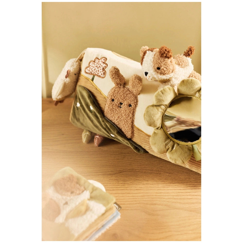 Jollein Soft Activity Book packaging features three brown and white stuffed animals, a green fabric element, and a gold ribbo