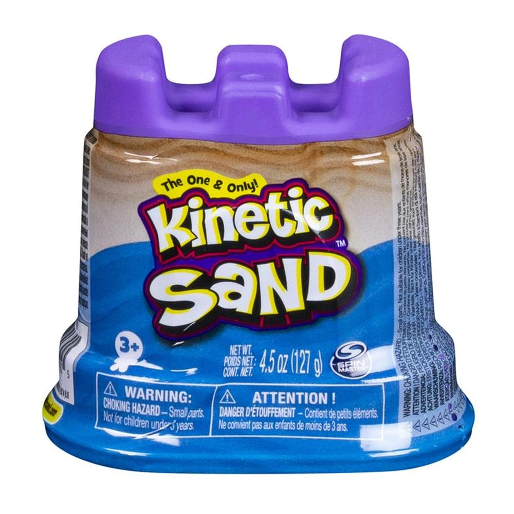 Kinetic Sand container in purple with textured surface and label, featuring safety warnings and a glossy finish.