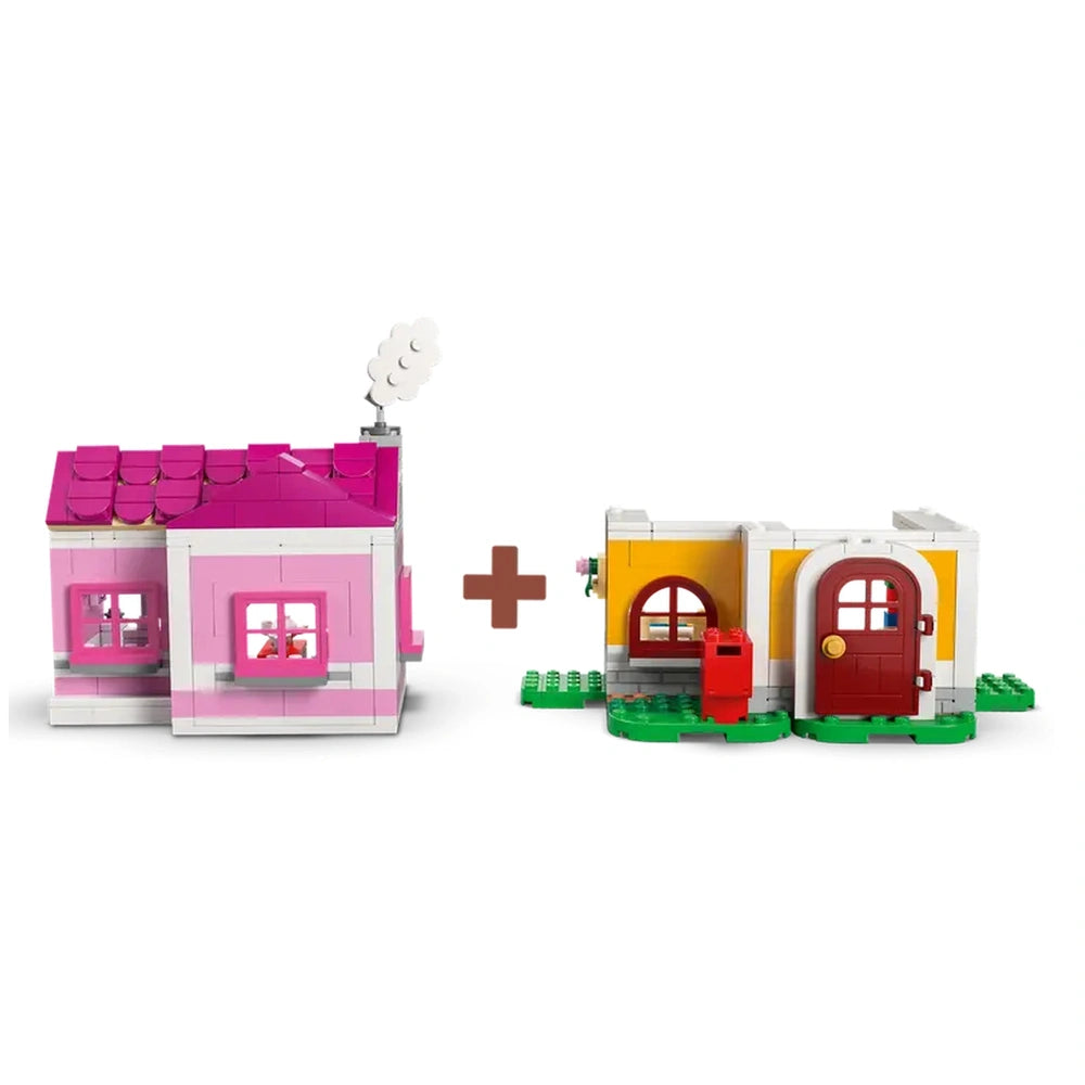 Two colorful LEGO houses: a pink one with a chimney and a yellow one with a red door, connected by green baseplates.