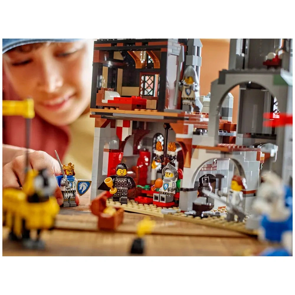 A child builds the LEGO Creator 3in1 Medieval Horse Knight Castle set, featuring colorful bricks, knights, and a treasure chest, with detailed castle interiors visible.