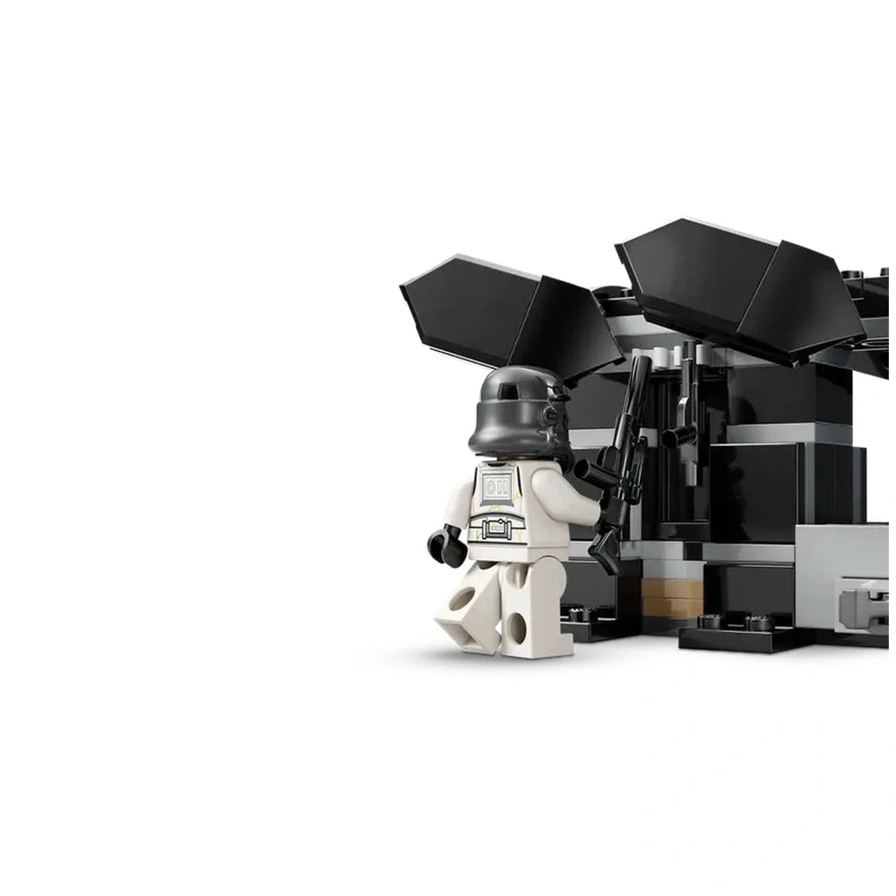 LEGO Death Trooper minifigure holding a blaster next to a black and gray dropship with open wings, ready for battle.