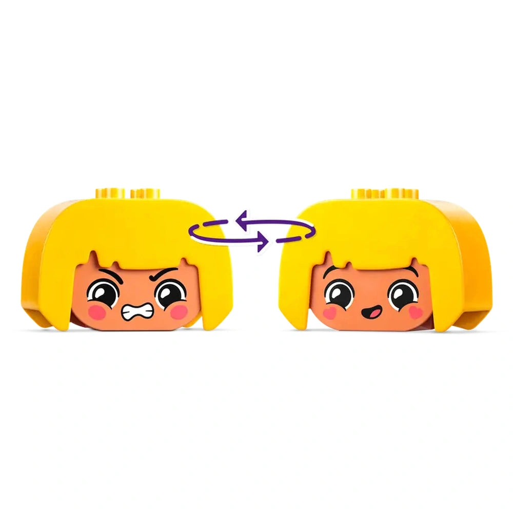 Two LEGO® DUPLO® character heads with interchangeable facial expressions, one showing anger and the other happiness, against a white background.