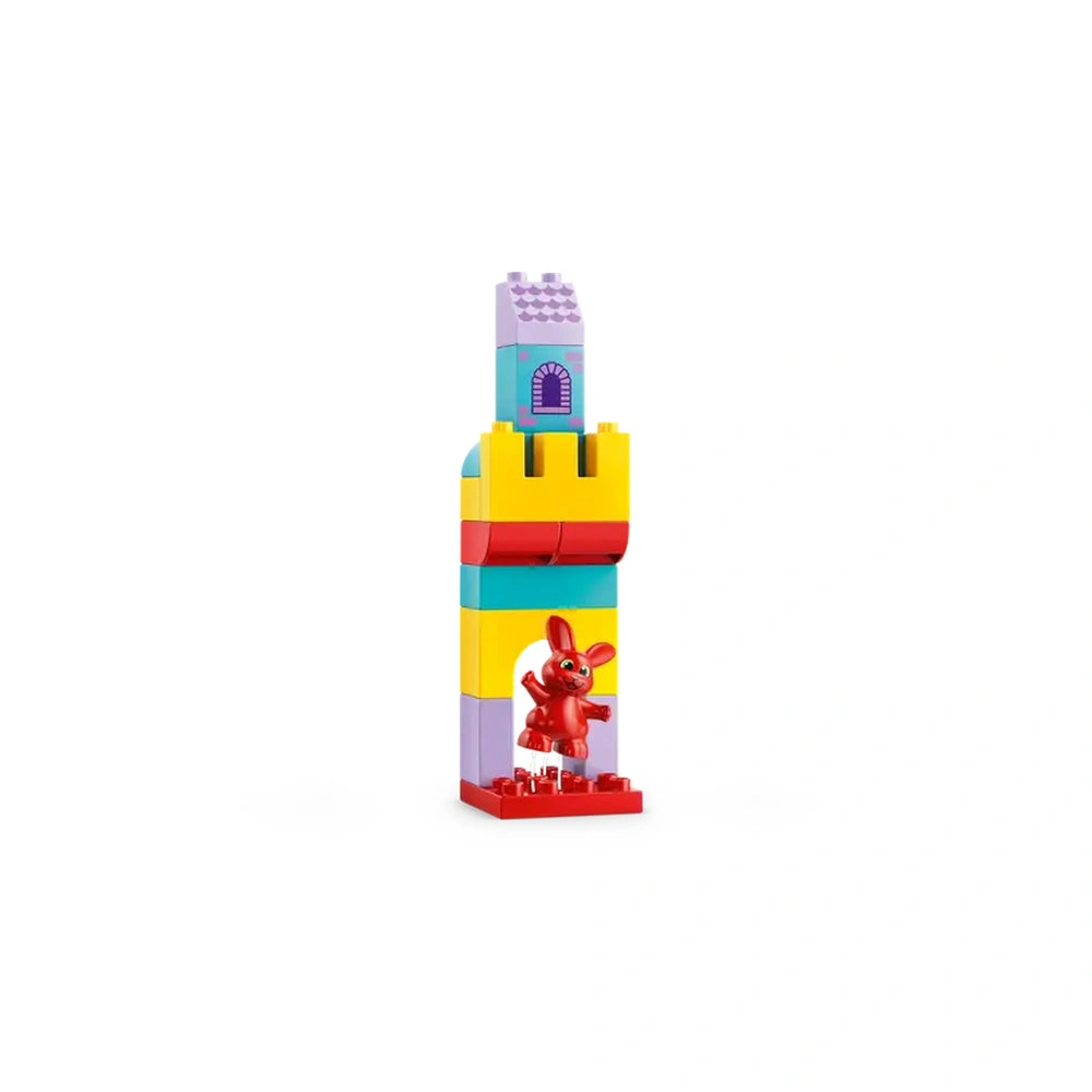 Colorful DUPLO castle featuring a red rabbit figure at its base, designed for interactive educational play.