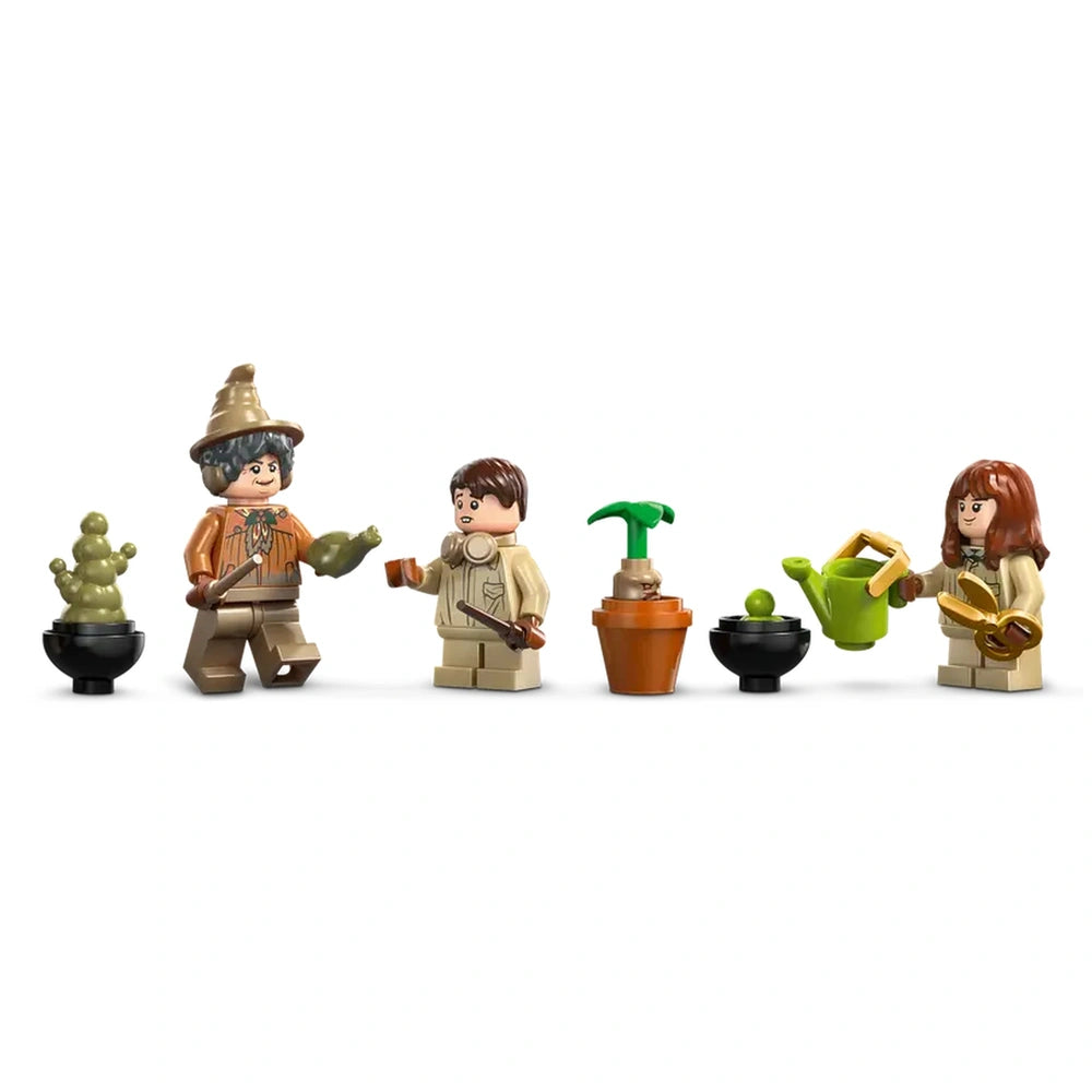 Two LEGO minifigures in herbology attire hold magical plants and tools, with a third figure interacting with a potted plant and watering can.