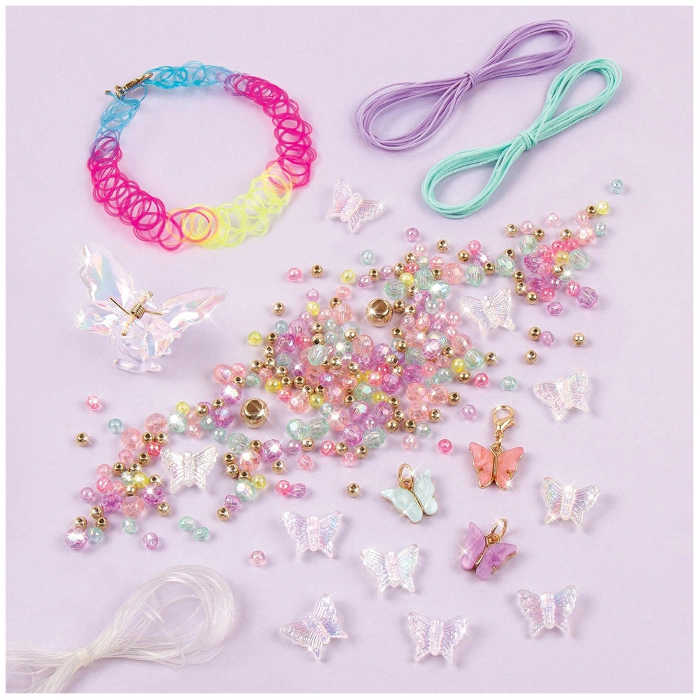 Butterfly jewelry set featuring a beaded bracelet with metallic clasp, purple hair tie, and translucent butterflies in vibran