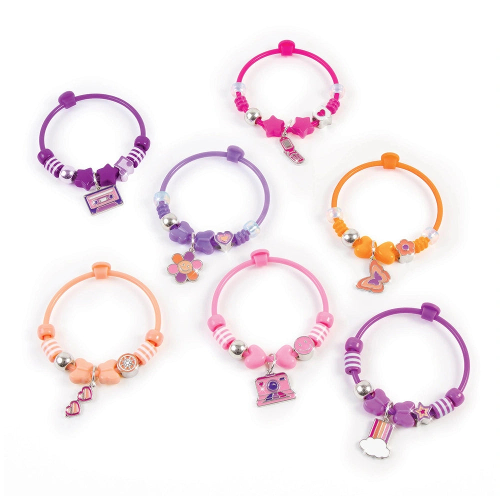 DIY Fashion beaded bangle bracelets in purple, pink, orange, and white with silver charms and clasps, made of flexible materi