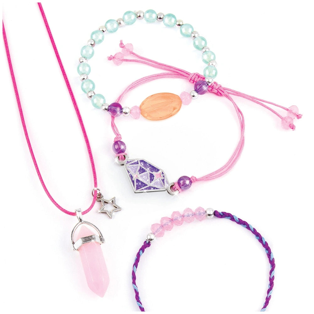 Positive Gems Jewelry features a pink necklace and blue bracelet adorned with colorful glass beads and metal clasps.