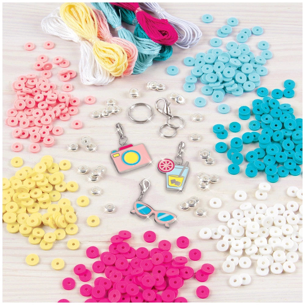 Summer Vibes Heishi Bead Set featuring colorful plastic beads and metal keychains with camera lens and strawberry charms.