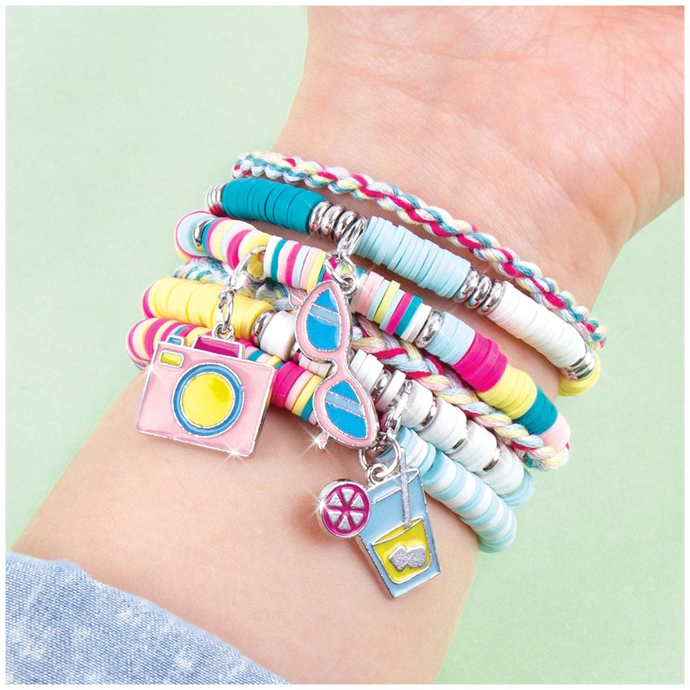 Summer Vibes Heishi Bead Set features colorful striped bracelet with multiple silver charms including red, white, yellow, and