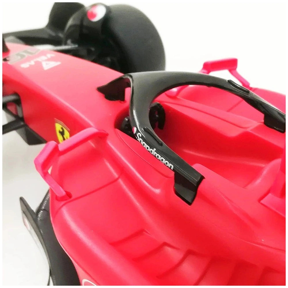 Mondo Ferrari F1 75 radio-controlled car in glossy red plastic with black detailing, showcasing full-function features.