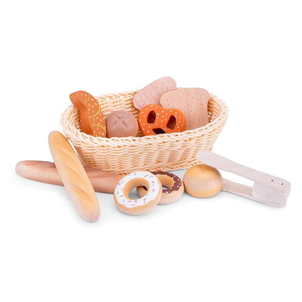 New Classic Toys Bread Basket set with wicker basket, wooden bread loaf, rolling pin, and multiple plastic dough cutters.