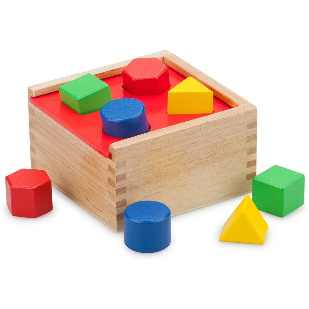 Colorful shape sorter toy featuring a wooden box and red, green, yellow, and blue plastic components for baby activity.