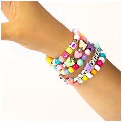 Beads ABC Magic Unicorn bracelet with colorful plastic beads in pink, blue, yellow, green, and purple, featuring a metallic c