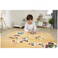 Noris 6 Puzzles - Vehicles: A child engages with colorful vehicle stickers on a wooden table in a cozy, bright room.