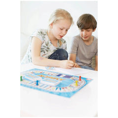 PIATNIK Activity Junior board game with colorful pieces on a smooth white table, two children engaged in play.