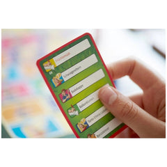 PIATNIK German Edition Activity Travel Board Game features a red matte cardboard with white text, colorful icons, and grid la