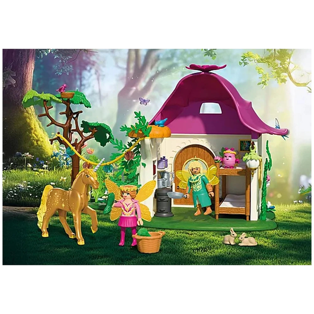 Playmobil Magic Unicorns Cozy Fairy Home features a purple roof and wooden furniture including bed, chair, table, and shelves