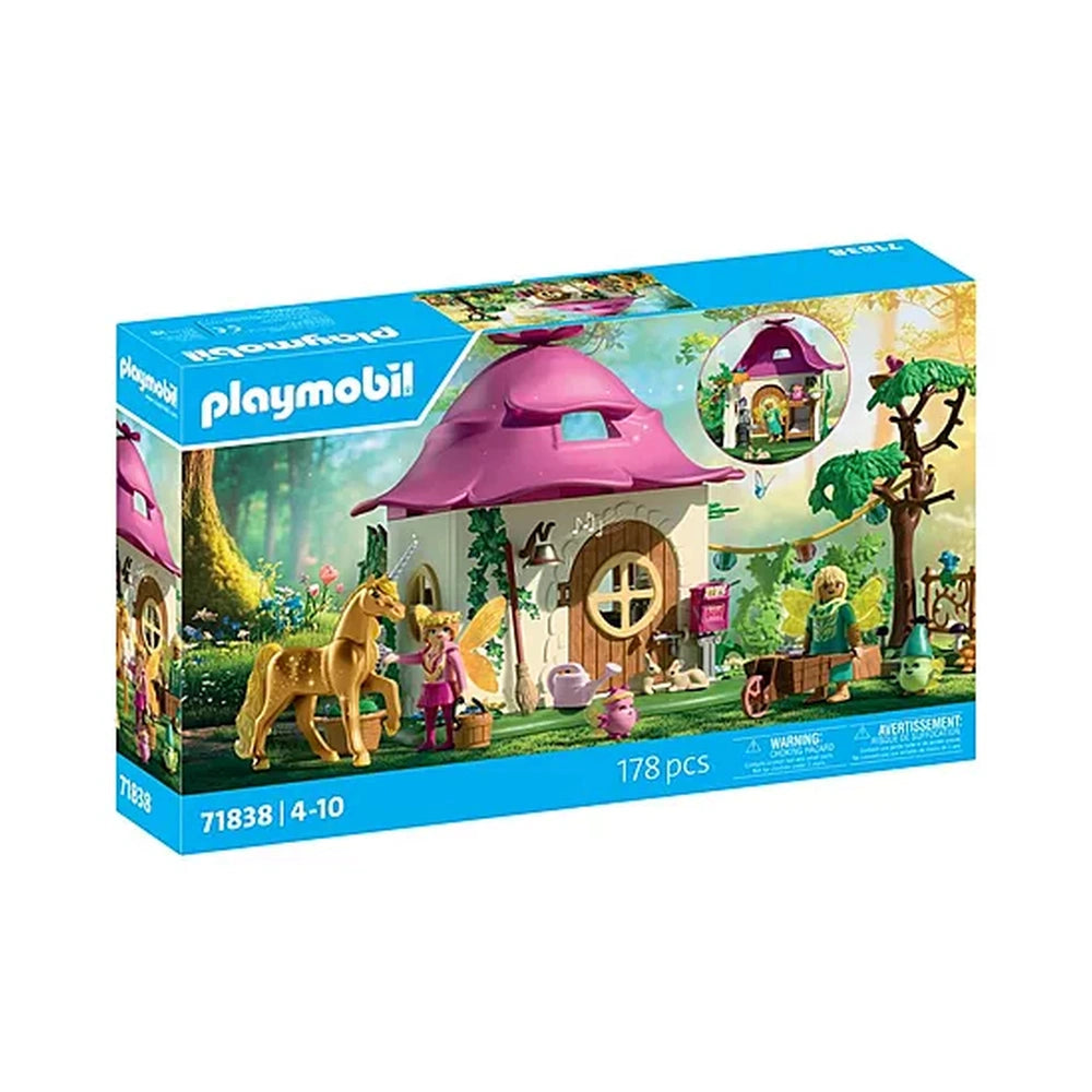 Playmobil Magic Unicorns Cozy Fairy Home packaging features a pink house, brown horse, and figures of a girl and boy.