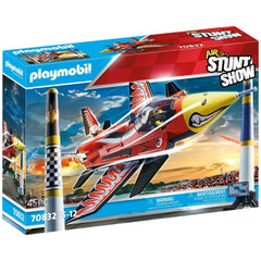 Packaging for Playmobil Stunt Show Air Jet Eagle toy playset, featuring the jet in vibrant colors against a blue sky backdrop, with a Playmobil pilot figure and large pylons included.