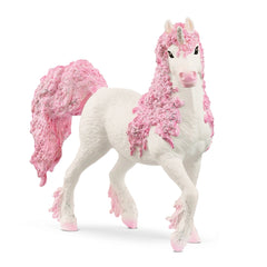 White unicorn figurine with pink accents, featuring a fluffy mane and tail, standing on a light background.