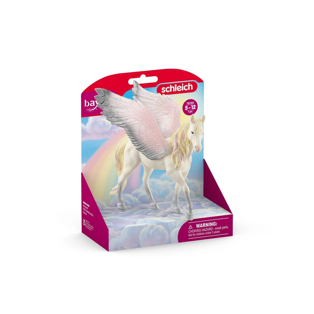 Bayala Sunrise Pegasus toy horse model in a standing position with wings spread, featured on colorful pink and white packagin