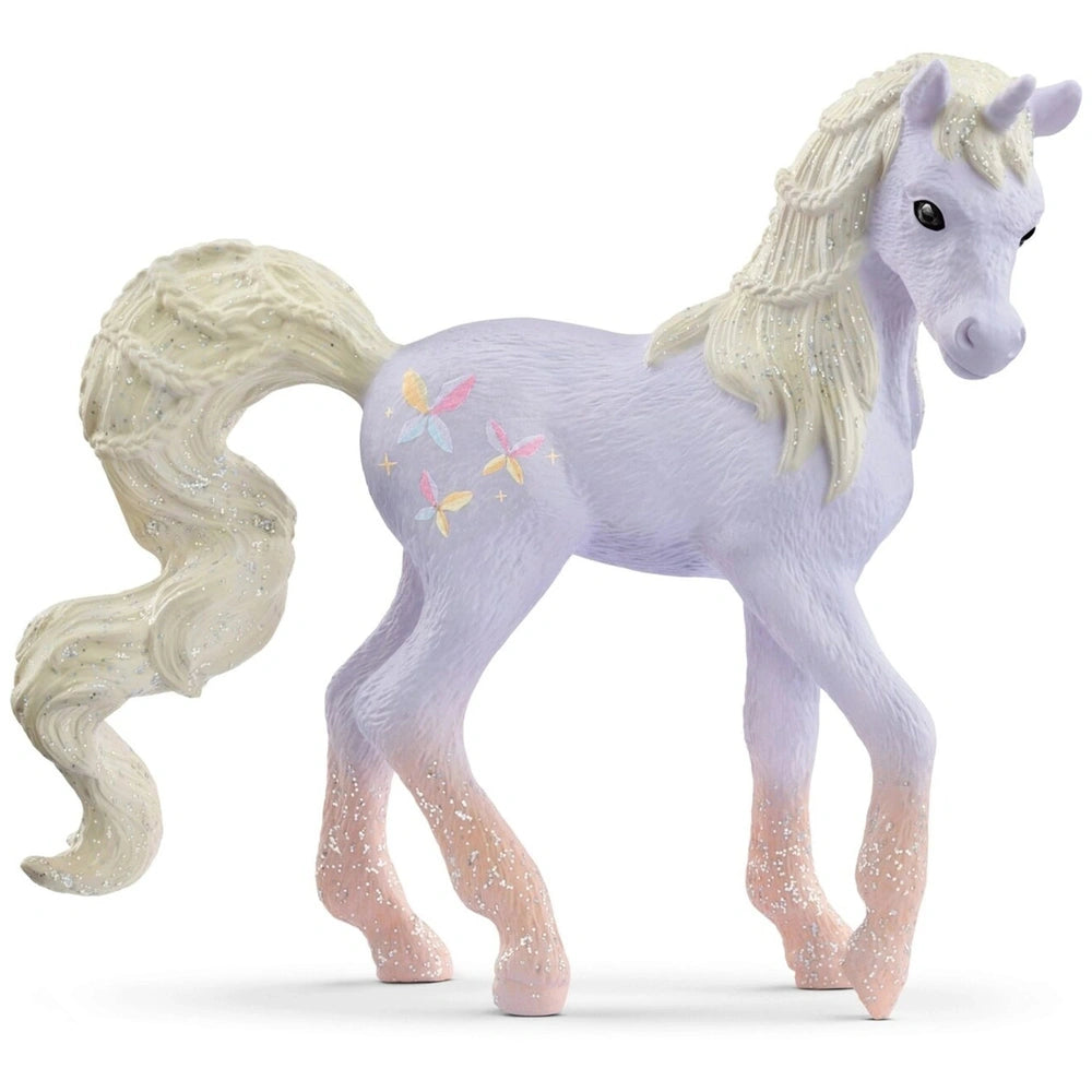 Unicorn figurine with a glossy white body, pale pink mane, and butterfly patterns in pink, blue, and yellow against a white b