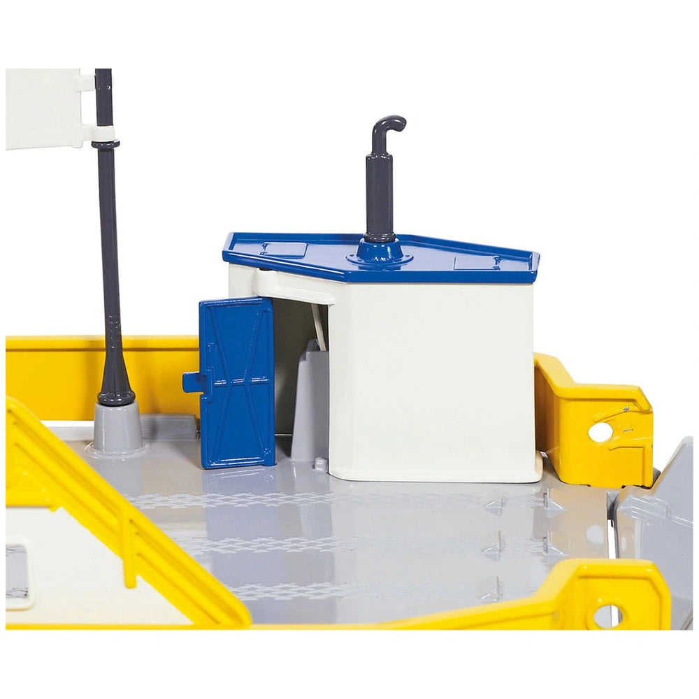 Siku car ferry toy playset featuring a model sink with a blue countertop and black lever-style faucet.