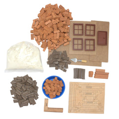 Teifoc Big Timber-framed house kit includes wooden blocks, boards, a blue bowl of pieces, and a white bag of powdery material