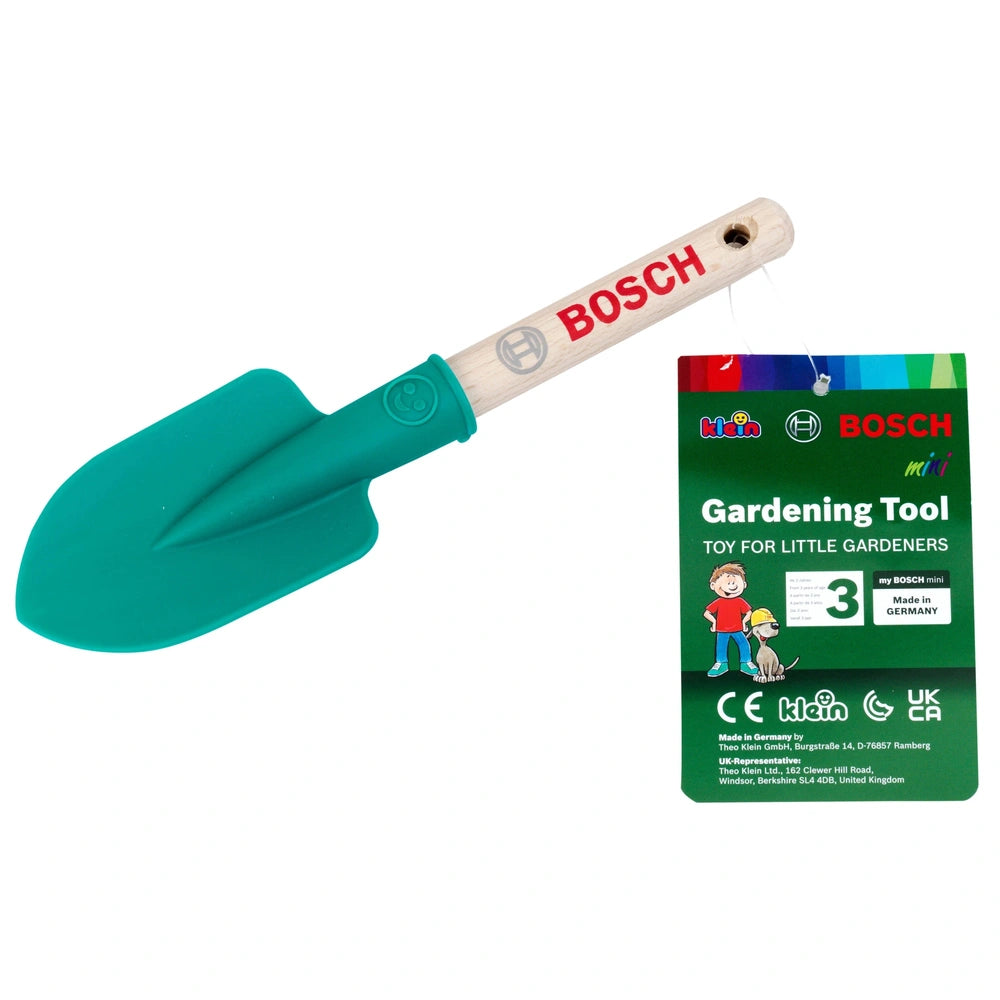 Theo Klein Bosch Garden hand shovel with a brown wooden handle and green plastic blade, packaged in green and white cardboard