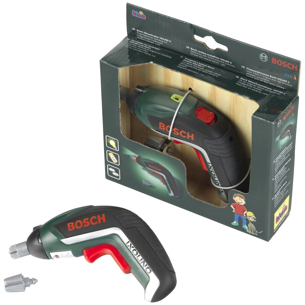 Theo Klein Bosch Ixolino II cordless drill in green and black with red battery pack, trigger switch, and side handle.